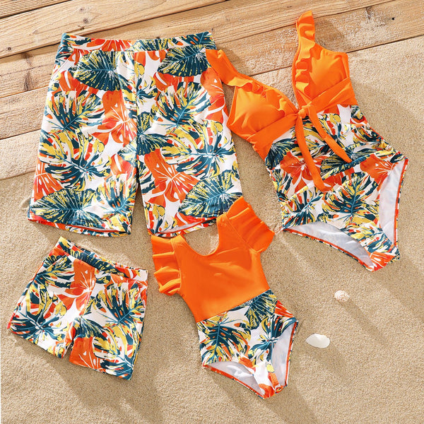 Family Matching Orange and All Over Tropical Plant Print Splicing Ruffle One-Piece Swimsuit and Swim Trunks Shorts - 20420434