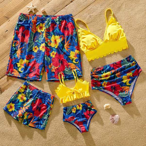 Family Matching Solid Scallop Trim Strappy Two-piece Swimsuit and Allover Floral Print Swim Trunks Shorts - 20604632