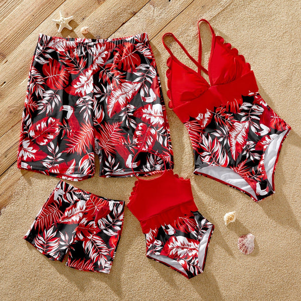 Family Matching Solid Scallop Trim Strappy Two-piece Swimsuit and Allover Floral Print Swim Trunks Shorts - 20586048